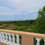 Vista al campo de una casa en venta en Puerto Plata, República Dominicana.
