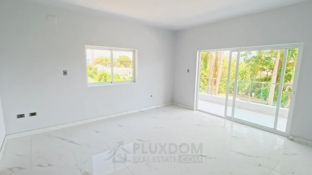 Habitación principal de una villa en venta en Puerto Plata, República Dominicana.