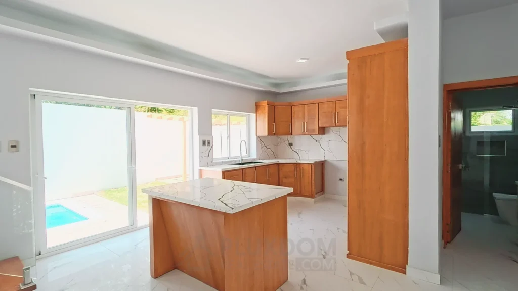 Comedor de una villa en venta en Puerto Plata, República Dominicana.