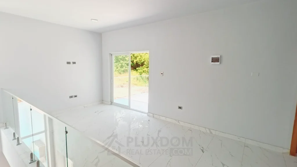 Sala de estar de una villa en venta en Puerto Plata, República Dominicana.