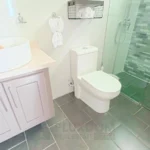 Baño secundario de una villa en venta en Puerto Plata, República Dominicana.