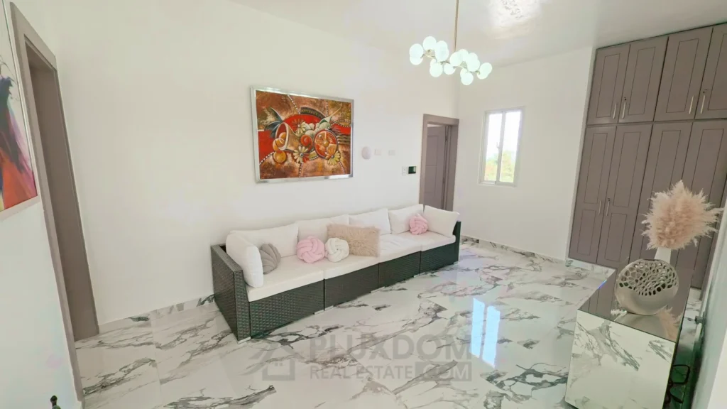 Comedor de una villa en venta en Puerto Plata, República Dominicana.