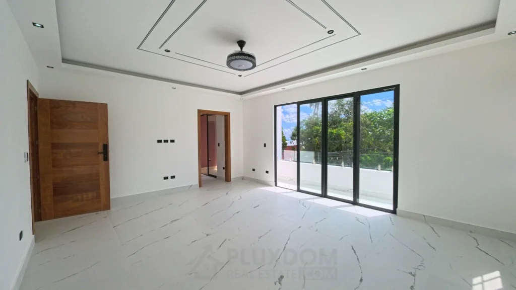 Habitación principal de una villa en venta en Puerto Plata, República Dominicana.