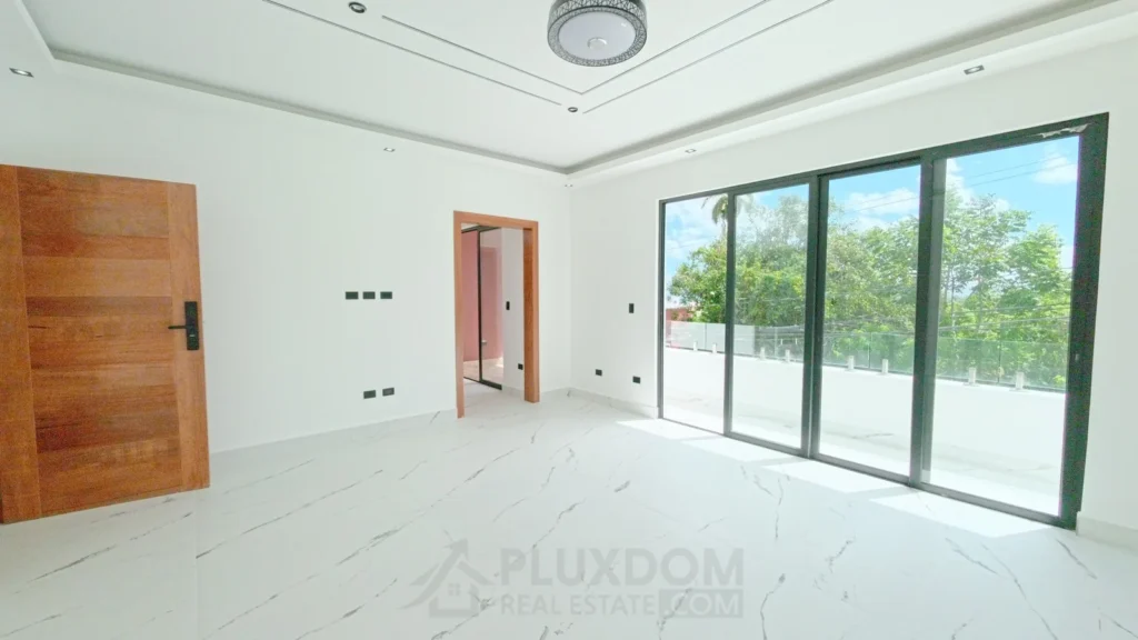 Habitación principal de una villa en venta en Puerto Plata, República Dominicana.