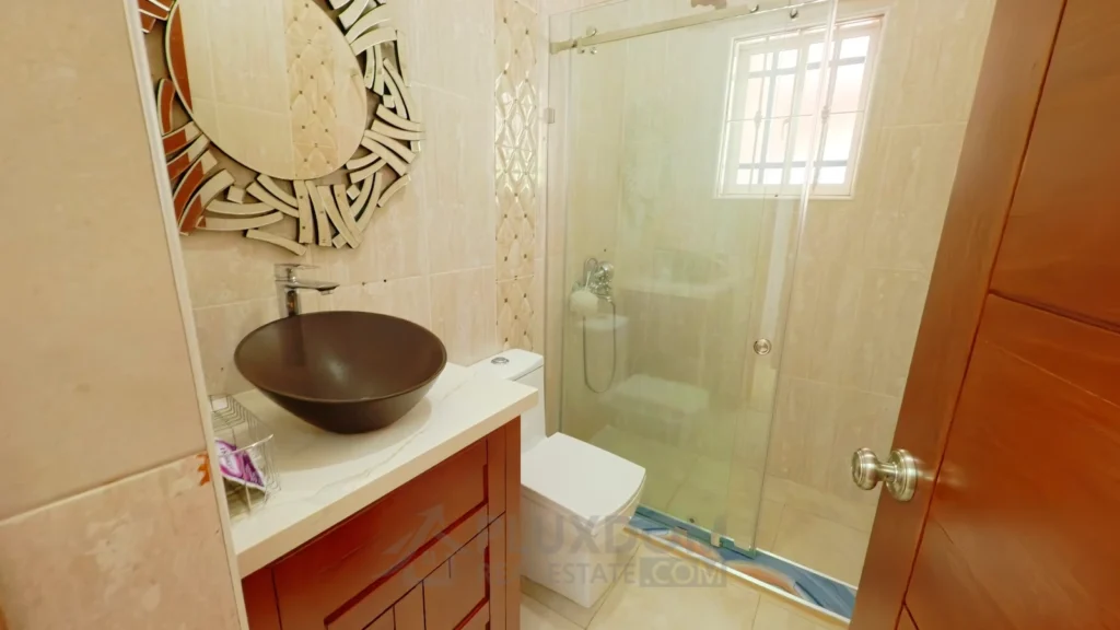 Baño secundario de una villa en venta en Puerto Plata, República Dominicana.